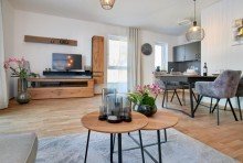 Wohnzimmer Pflegeimmobilie mit Mietpool & KfW-F�rderung: Renditestark & sicher ab 184.170 EUR
